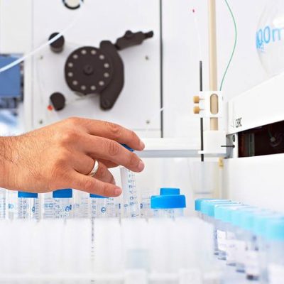 A human operating our ICP OES machine